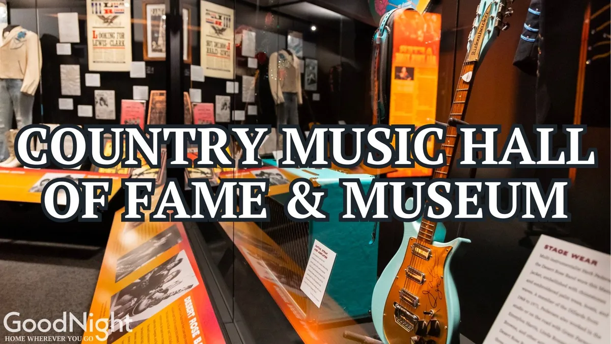 Showcasing guitars, stage wear, and exhibition displays filled with historical music memorabilia, this image immerses viewers in the essence of the Country Music Hall of Fame. The exhibits highlight the evolution of country music and its icons.